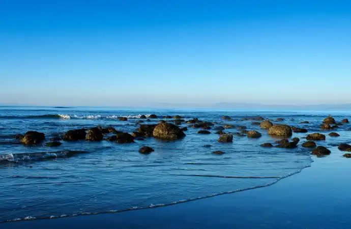 Inani Beach rocky shoreline at low tide in Cox's Bazar