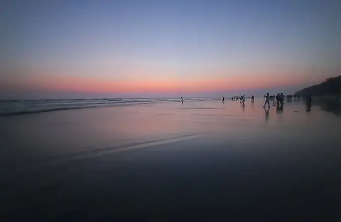 Libanza Films crew filming a travel film on the Cox's Bazar coastline